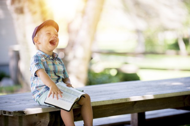 A boy in Pittsburgh had difficulty reading but now loves it after being tutored.